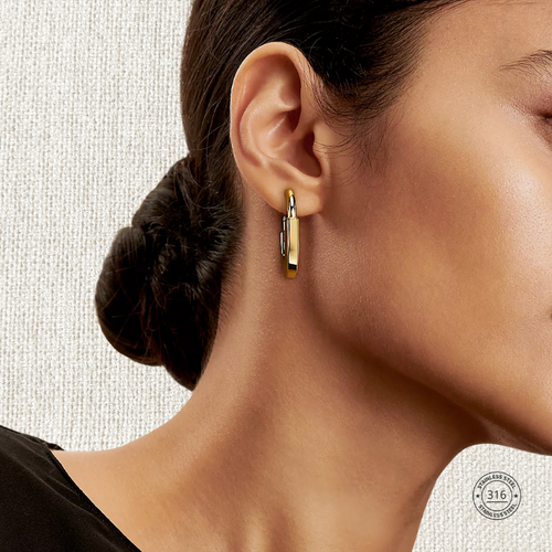 Arete Lock mediano, dorado, acero inoxidable.