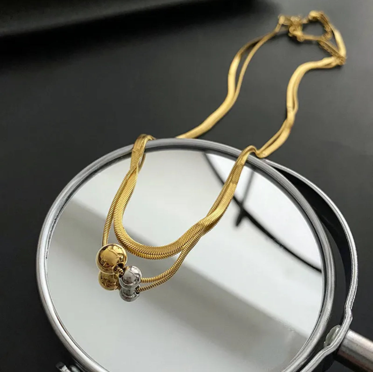 Cadena bolitas dorado. Acero Inoxidable