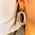 Aretes grandes, dorado con plateado. Acero inoxidable